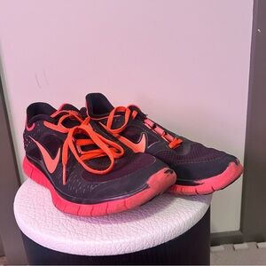 Nike Free Run Black and Orange  Athletic Shoes. Size 9.5
